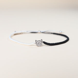 ハンドメイド 猫の編み込みブレスレット - 黒白