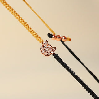ハンドメイド 猫の編み込みブレスレット - キジトラ